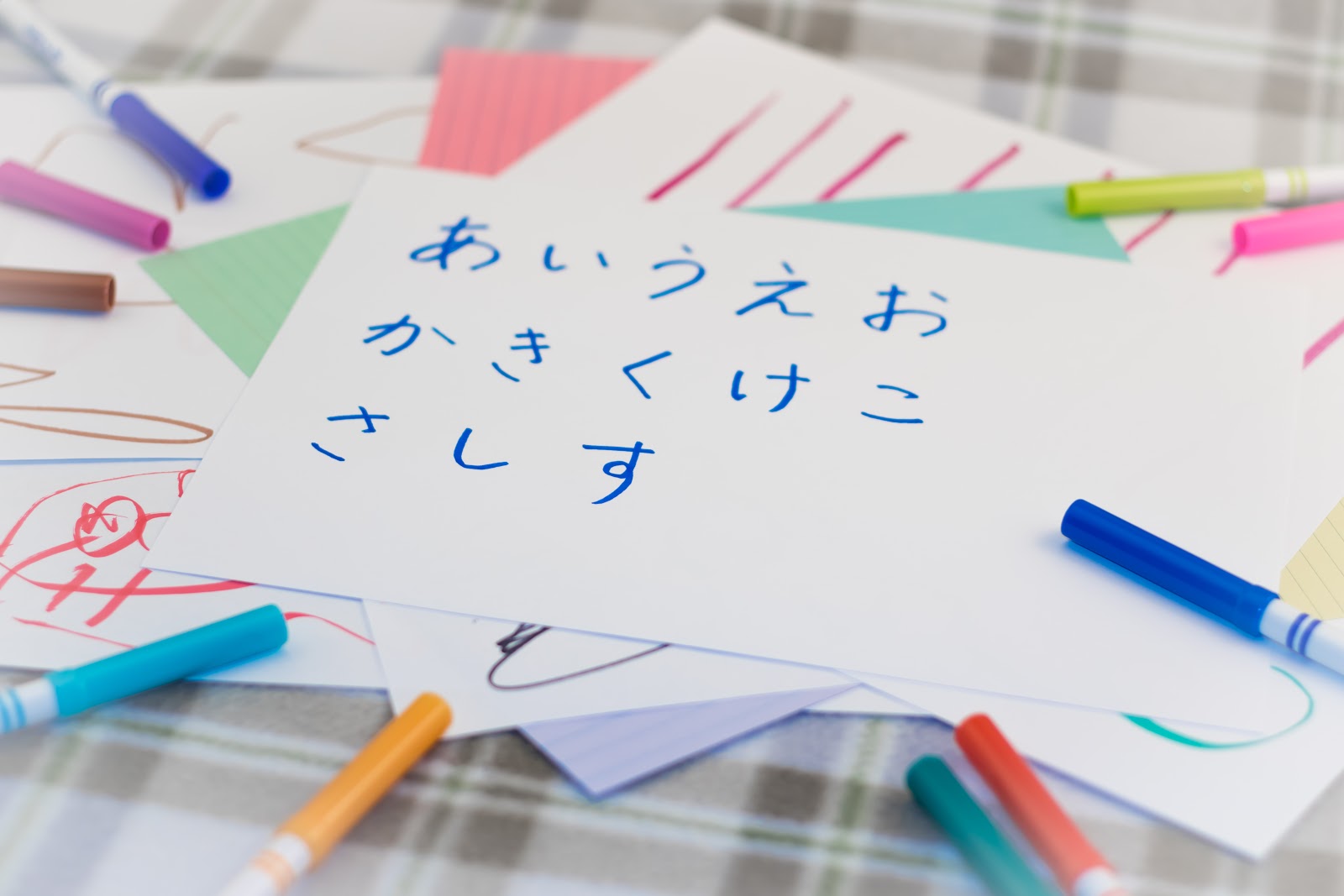 Another techniques of remembering Hiragana characters is writing on the paper.