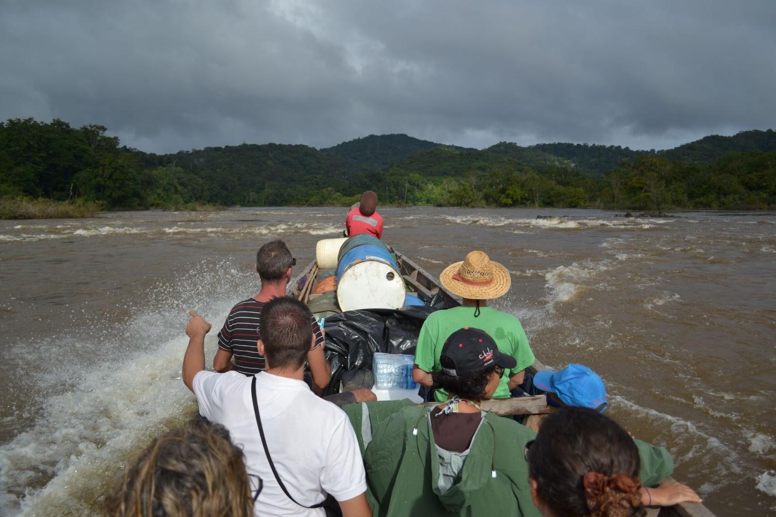 a boat trip with tourists on the way to warapoka village, guyana