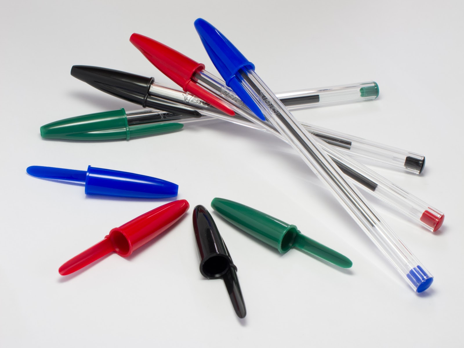 File:4 Bic Cristal pens and caps.jpg - Wikimedia Commons