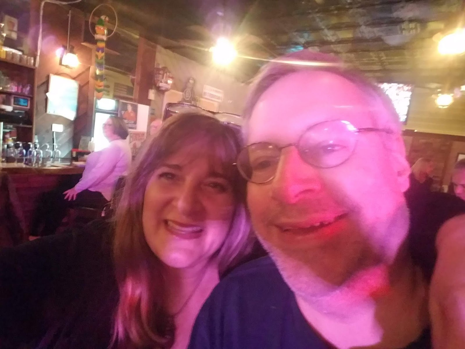 photo of Anne Chance and her husband in a restaurant 