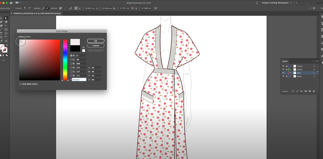 Fashion designer utilizing Adobe Illustrator for design creation