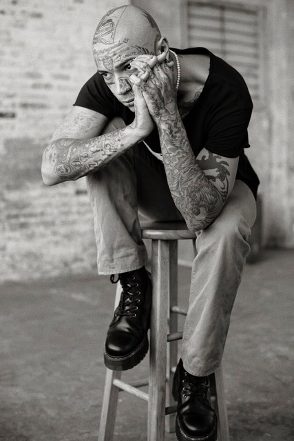 As part of the Marketing Mentor process, I need to get to know the photographer and their work intimately. This black and white image taken by Steve of a tattooed man sitting contemplatively on a stool is a great example of his skill with lighting as well as his ability to capture the essence of a person in their portrait.