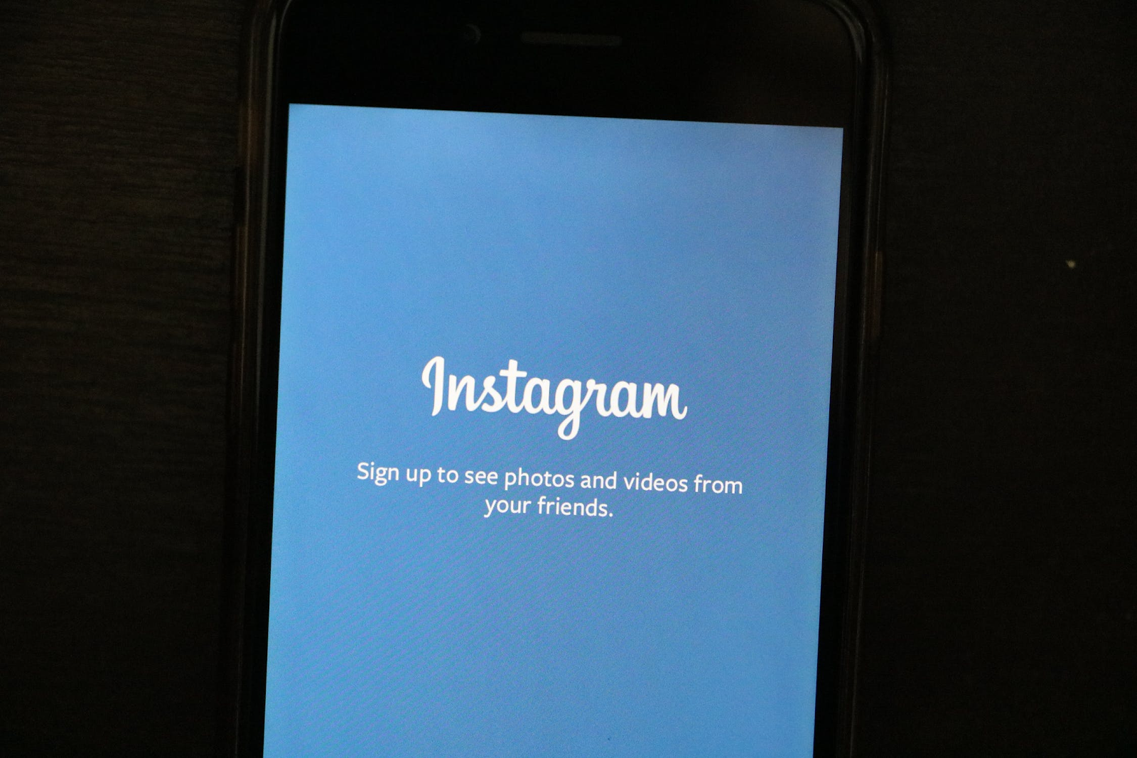 A mobile phone displays Instagram’s home page