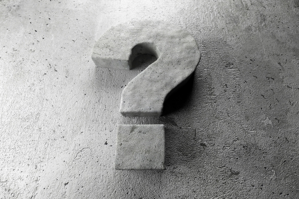 stone-question-mark-symbol-concrete-background