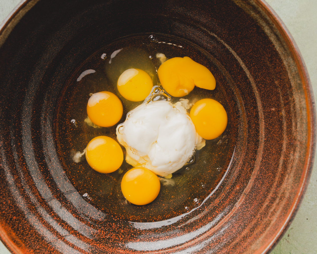 eggs, ricotta, salt, and pepper in a bowl