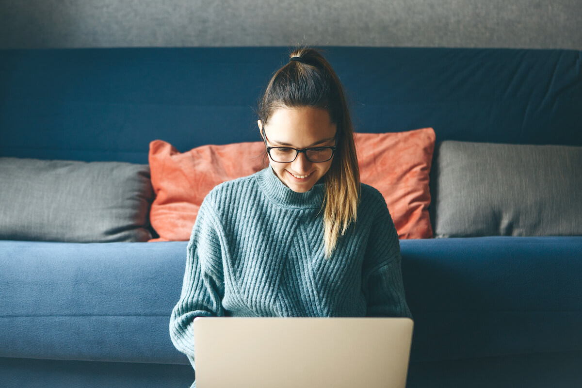 Digital patient engagement: person happily working at home