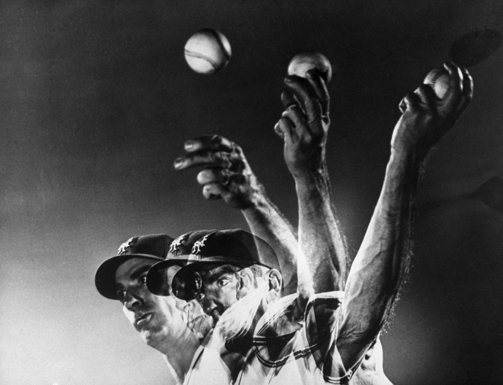 New York Giants pitcher Carl Hubbell throws a curve ball, 1940.