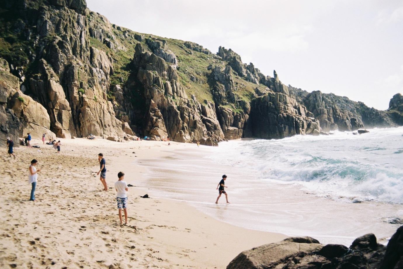 People on a beach

Description automatically generated with medium confidence