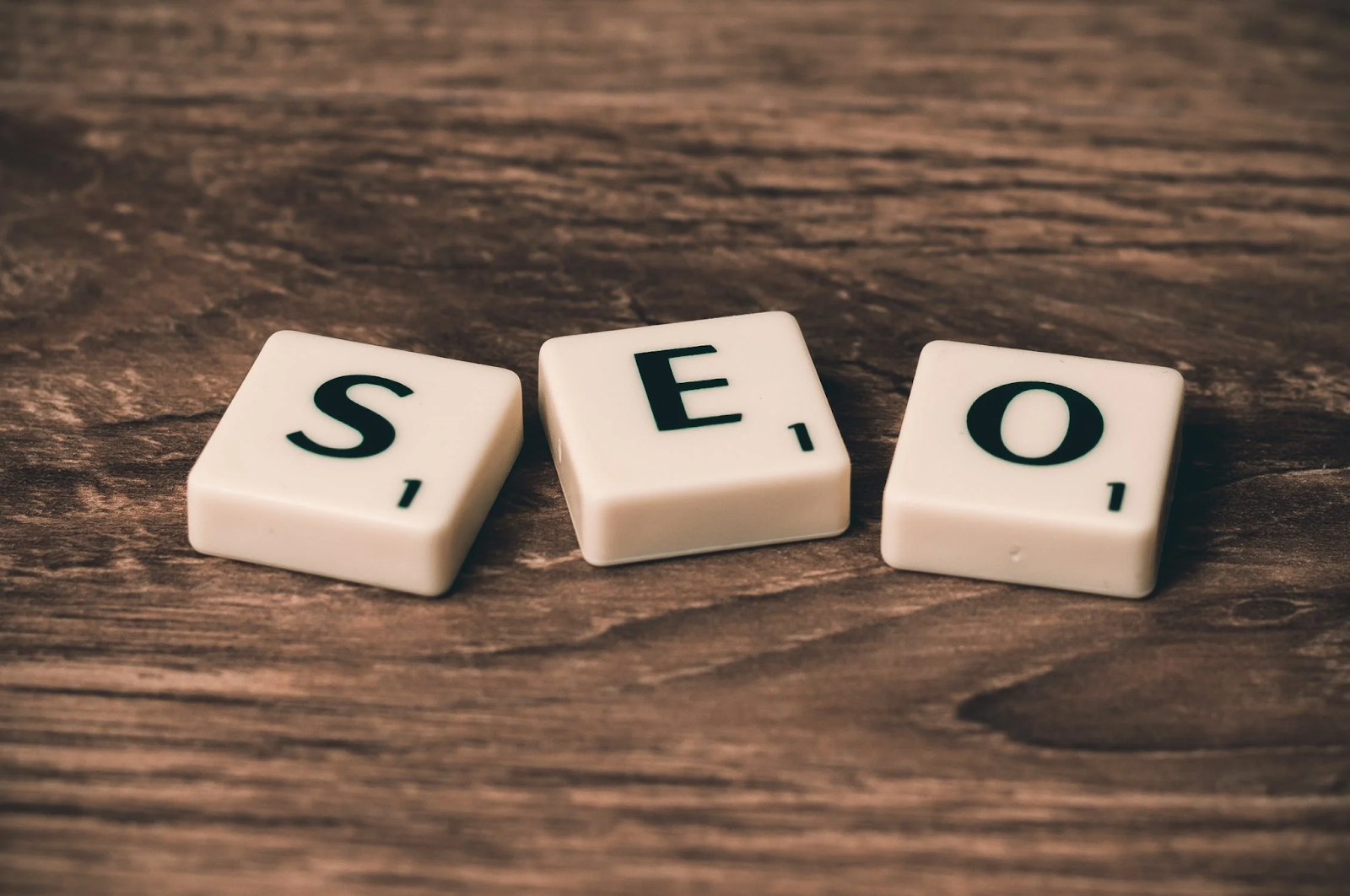 scrabble tiles spelling out "SEO" as SEO is crucial for your animation marketing framework