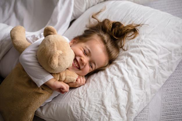 little-girl-bed-with-soft-toy-emotions-child_169016-1968.jpg