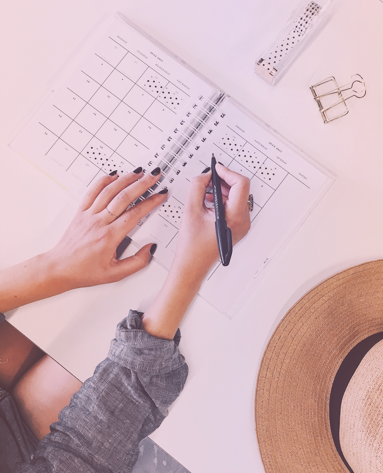 girl writing in calendar