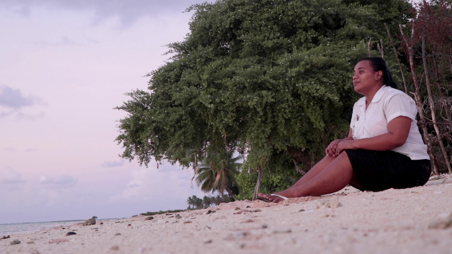 Image 1. Maritina Nakekea, 19, is a resident of Kiribati, a country made up of 33 coral atolls located halfway between Australia and Hawaii. Today Kiribati's existence is threatened by climate change. Photo: Itinnaibo Aukitino/iGeneration Youth