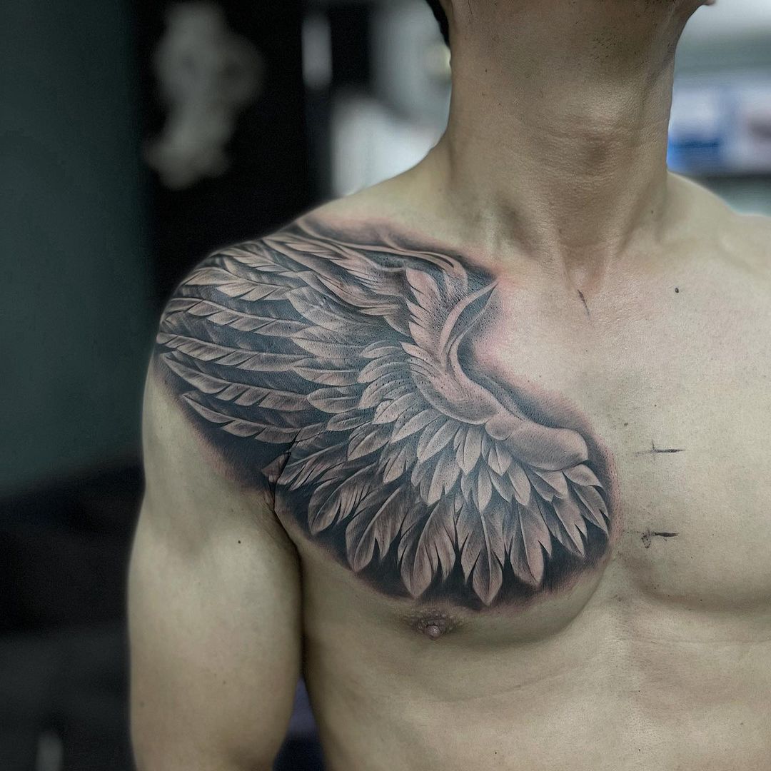 Black And Gray Large Wing Tattoo