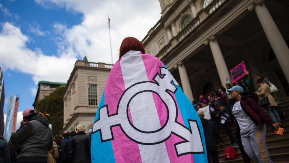 L.G.B.T. activists and their supporters rally in support of transgender people on the steps of New York City Hall, October 24, 2018 in New York City.