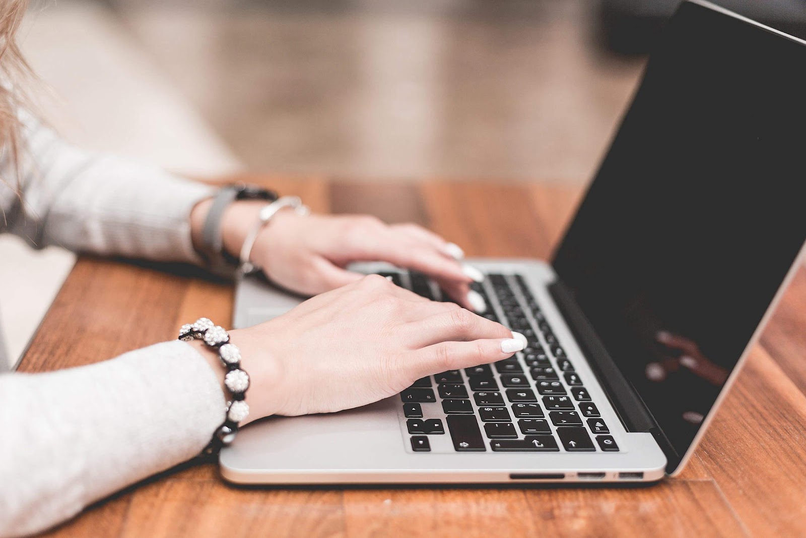 young-woman-working-typing-on-her-laptop_free_stock_photos_picjumbo_HNCK2983-2210x1474.jpg