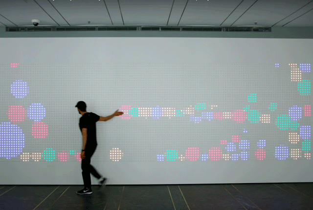 An Interactive Wall at Google Is Made From Thousands of Arcade Buttons | Interactive  walls, Interactive design, Interactive exhibition