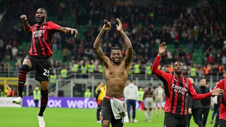 Rafael Leao leads Milan players in celebration after the win over Genoa