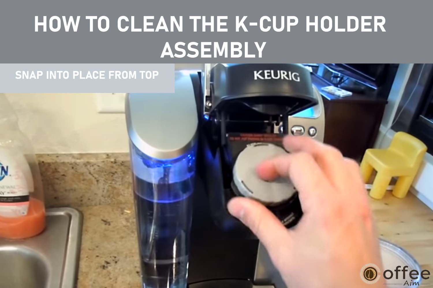 Press down firmly from the top to snap the K-Cup Holder back into place securely.
