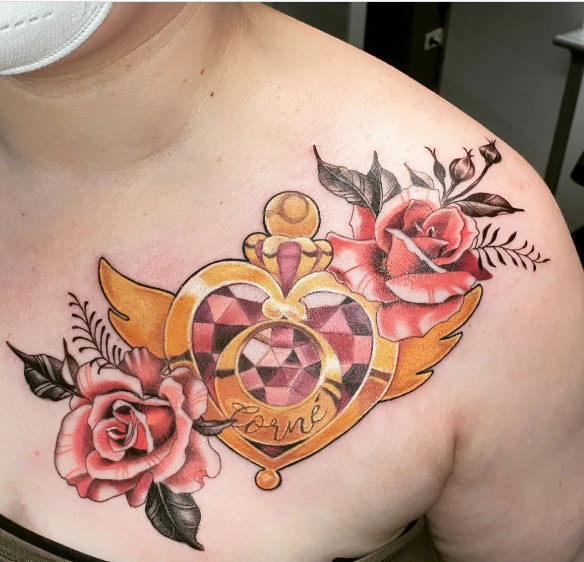 Sailor Moon And Roses Chest Tattoo For Women