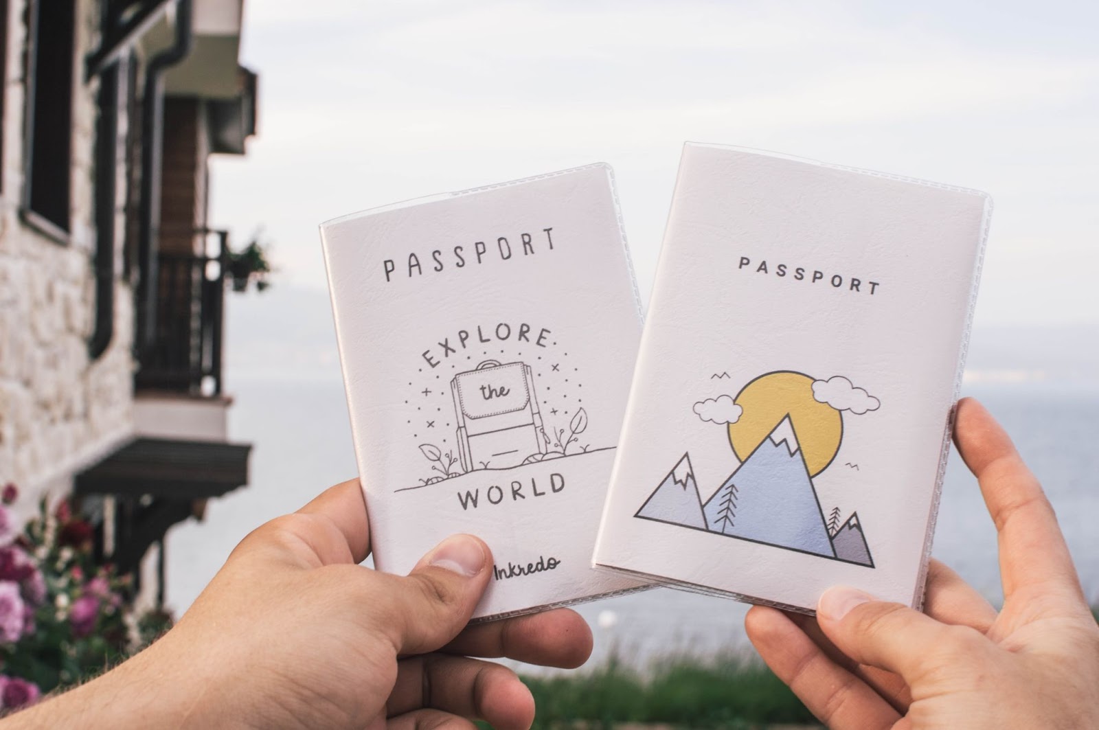 passport cases with "explore the world" written on them