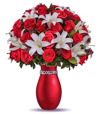 A red vase with white and red flowers

Description automatically generated with medium confidence