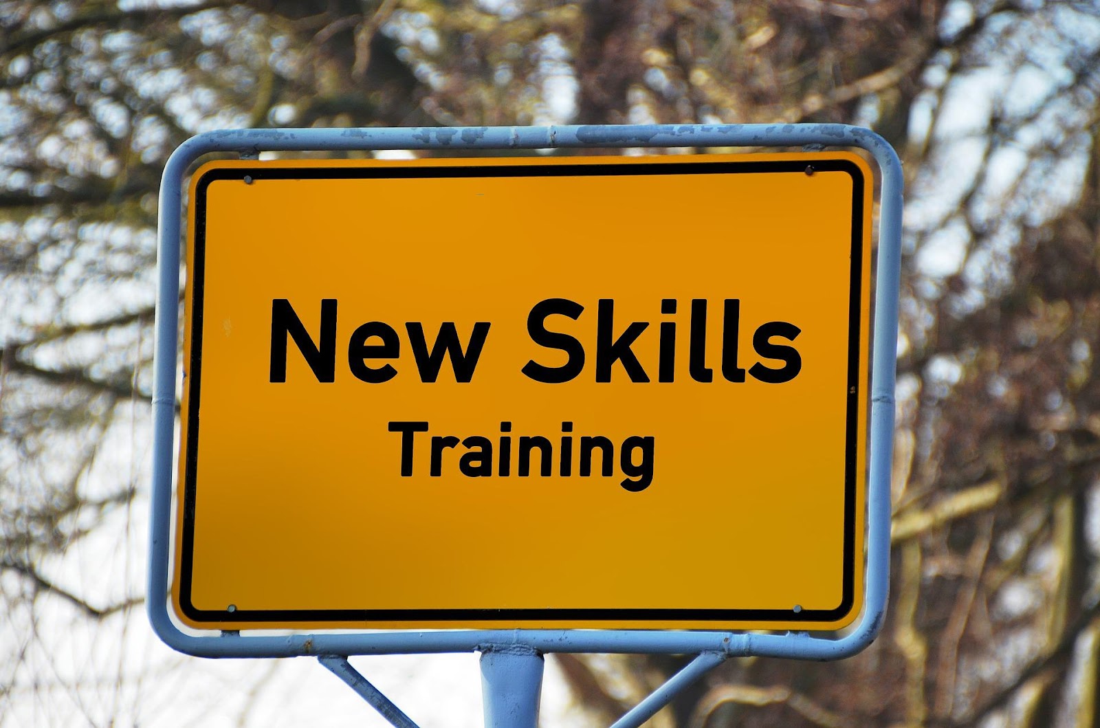 sign that says new skills training