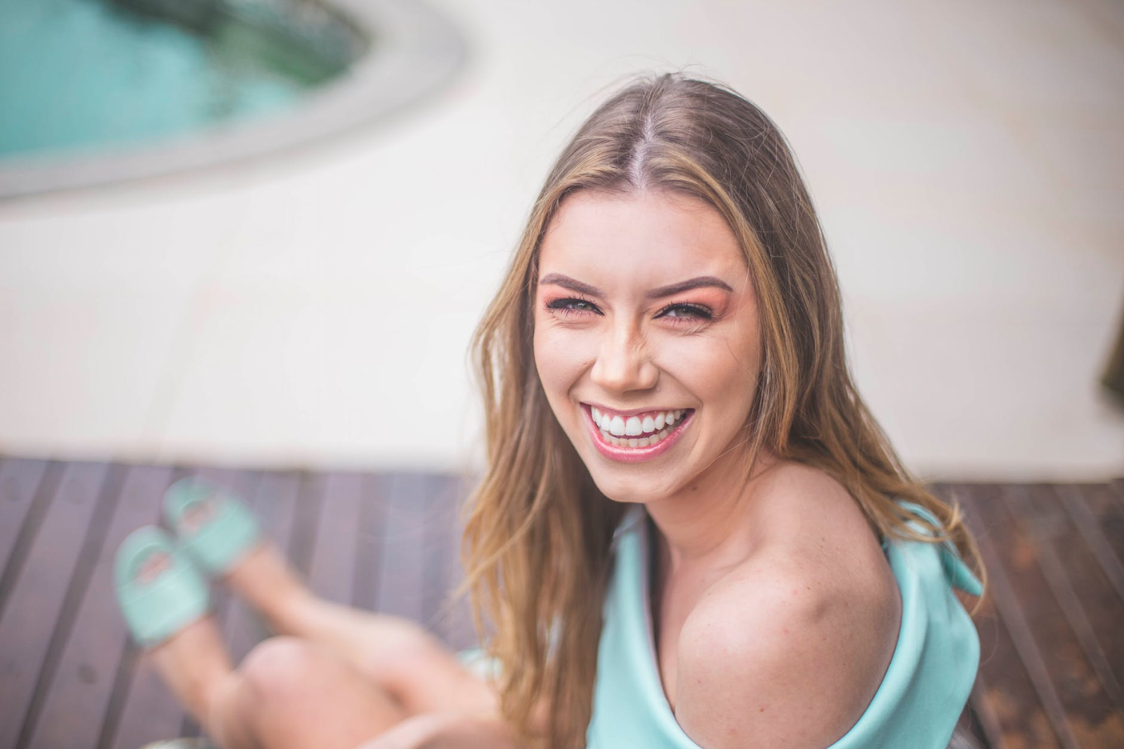 a woman with a big smile, showing the beauty of oral health