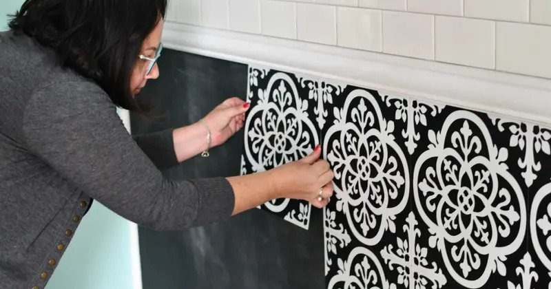 peel and stick tile being installed in an RV