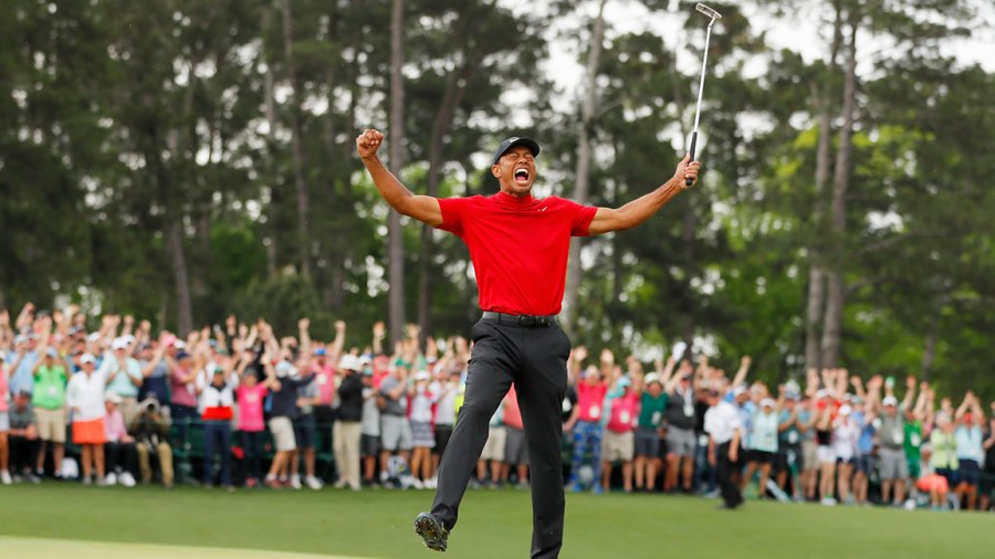 AUGUSTA, GEORGIA - APRIL 14: (Sequence frame 5 of 12) Tiger Woods of the United States celebrates after making his putt on the 18th green to win the Masters at Augusta National Golf Club on April 14, 2019 in Augusta, Georgia. (Photo by Kevin C. Cox/Getty Images)
