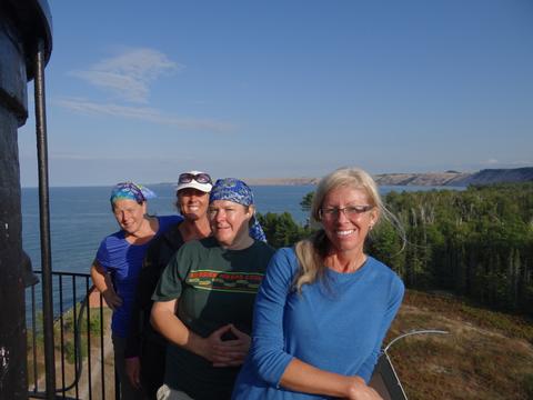 Our backpacking group atop the lighthouse in Pictured Rock.