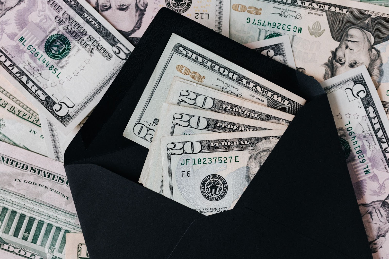 Money in an envelope to show tax tips for influencers