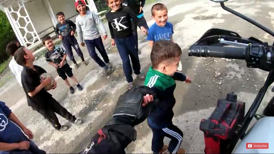  On the way to Afghanistan, Greeting the kids who were playing.