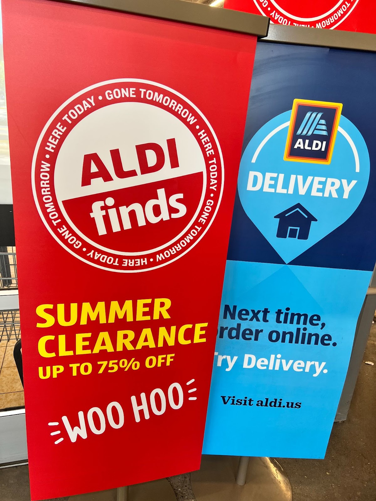 Display of summer clearance sign at an Aldi store