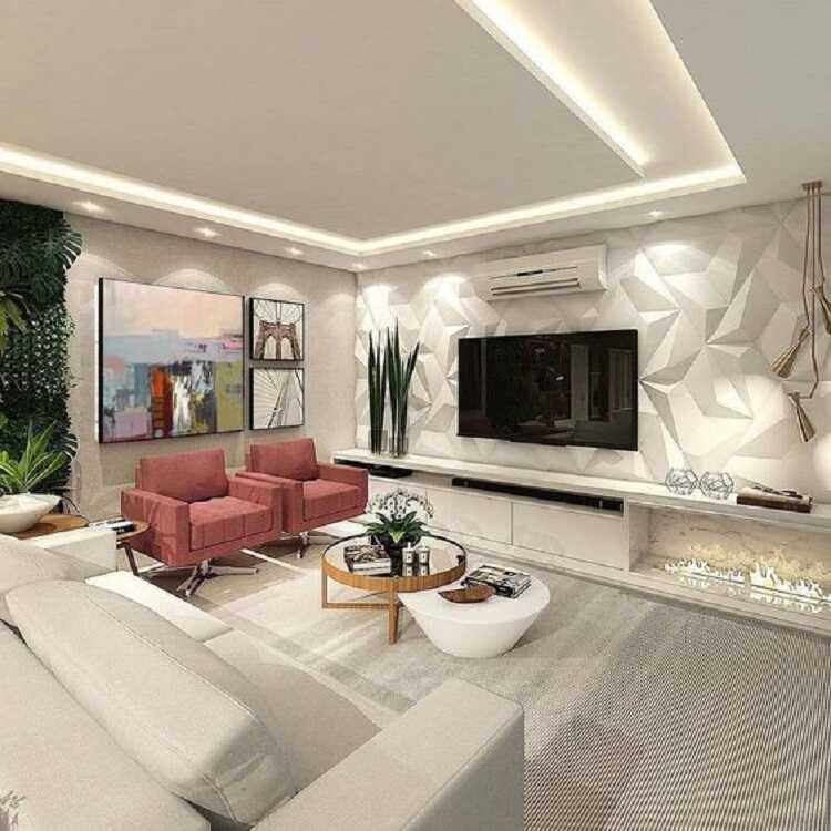 Xốp dán với hoa văn 3D màu trắng với các khối hình học tạo điểm nhấn hiện đại cho phòng khách chung cư