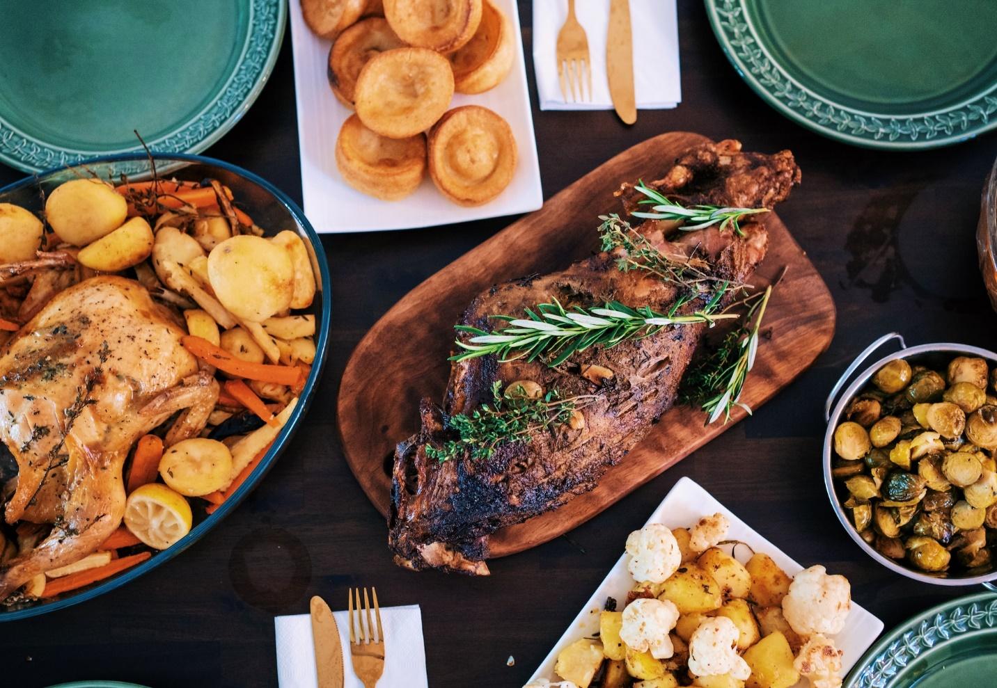 Several plates of food on a table