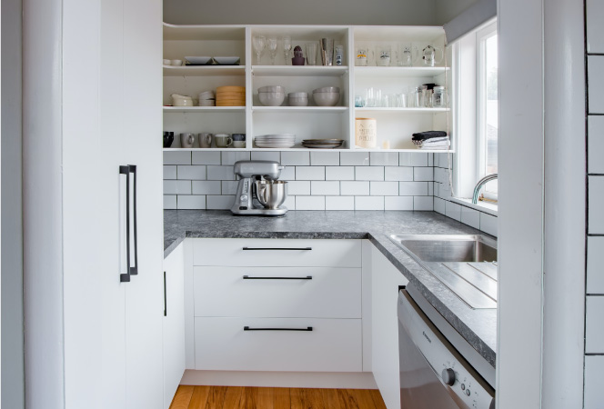 A very sleek looking galley kitchen