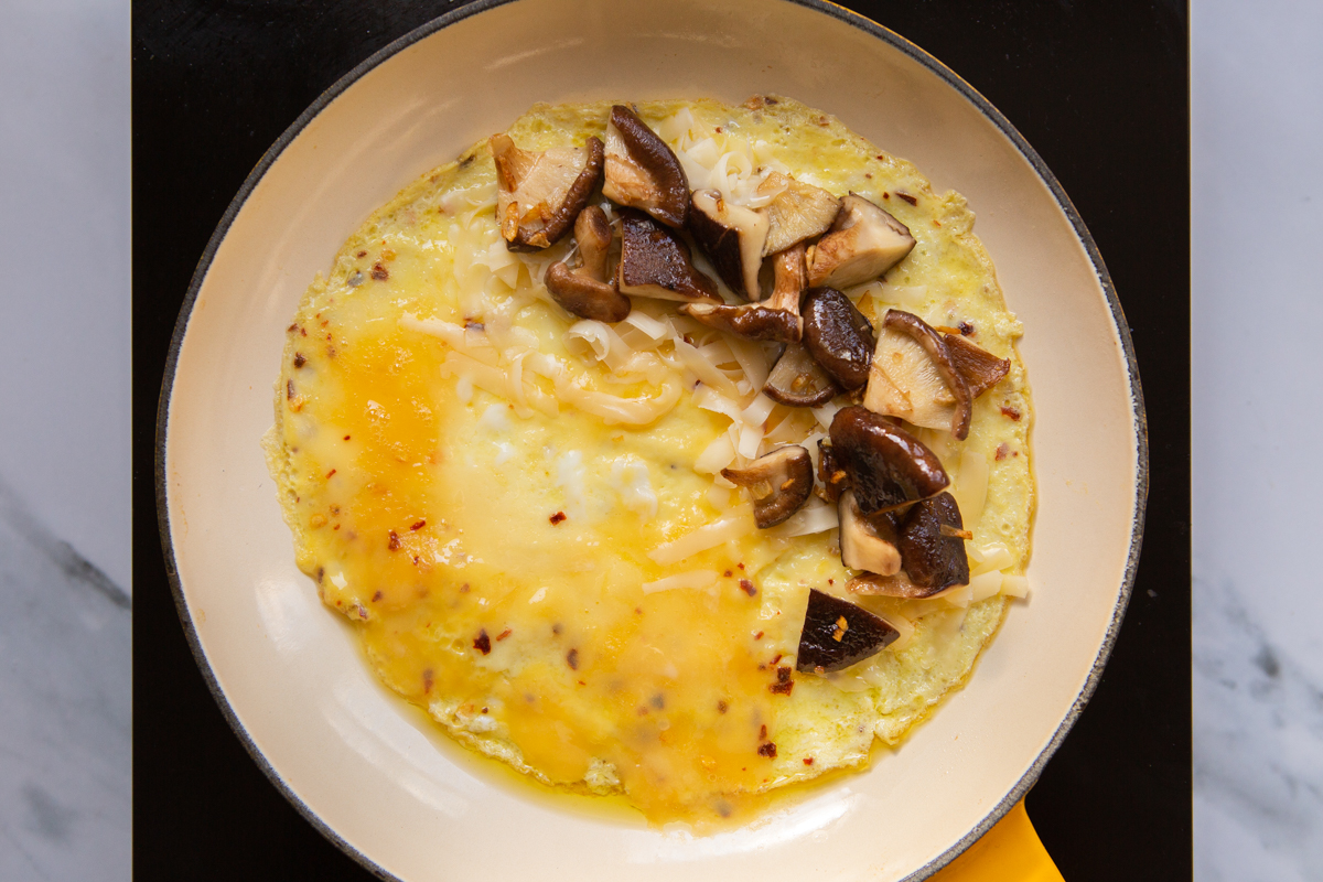 shiitake mushroom filling added to omelette