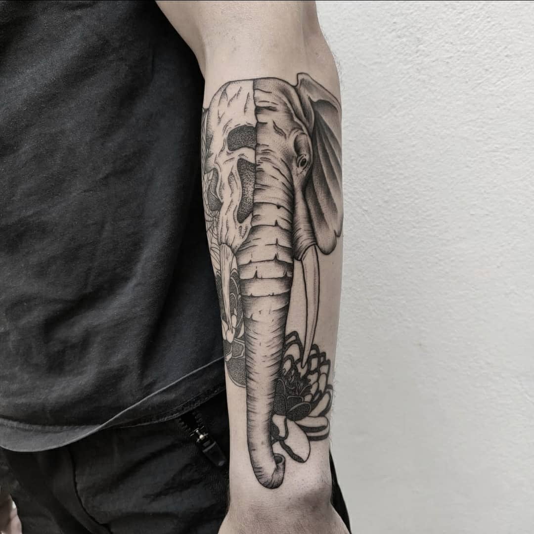 Half Elephant Half Skull Tattoo On Forearm