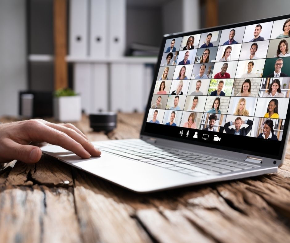 A person on a virtual meeting call with virtual assistants.