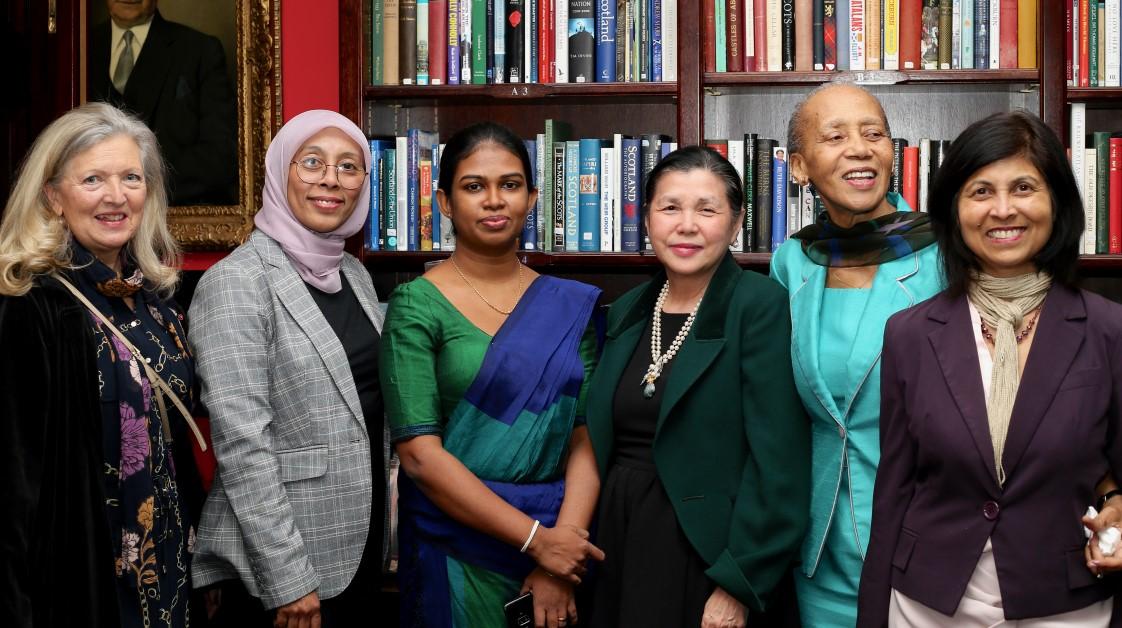 A group of people posing for a photoDescription automatically generated