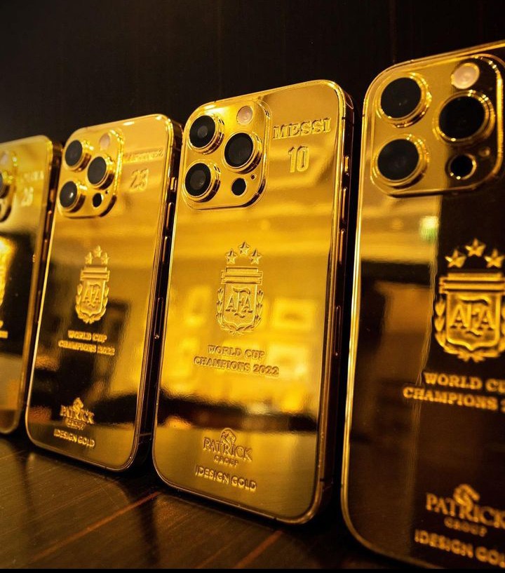 messi iphones gold gift for world cup on black background