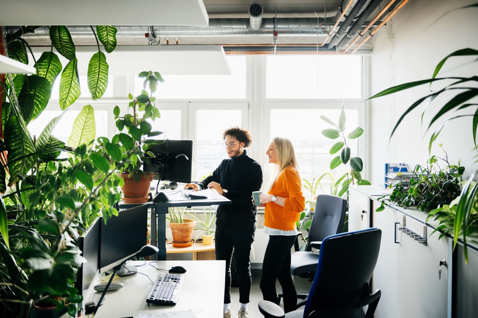 Two workers working together