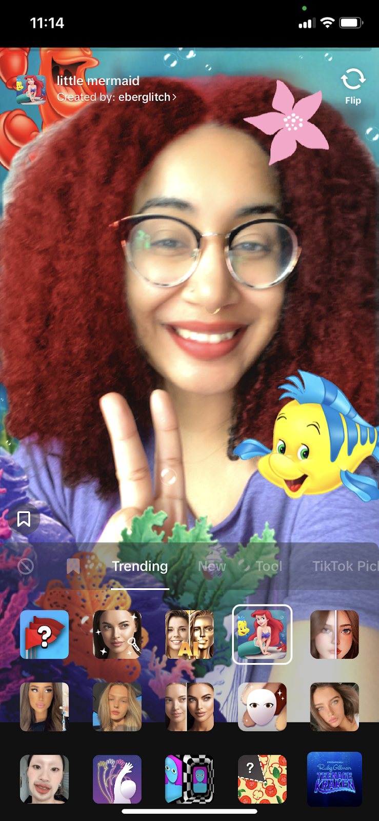 Woman using TikTok's Little Mermaid filter; How to Use TikTok