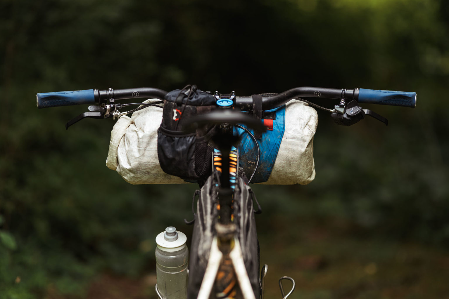 Mountain bike drop bars don’t have space to attach backpacking gear vs. drop bars that do.