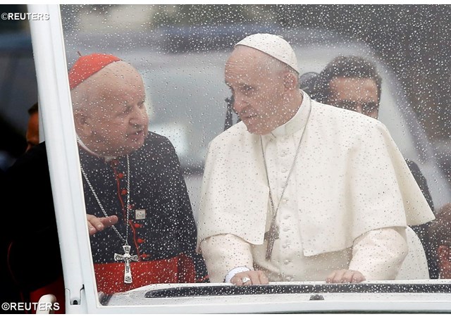 Pope Francis with the Archbishop of Krakow Cardinal Stanislaw Dziwsz in the popemobile on the way to the Wawel Castle complex - REUTERS