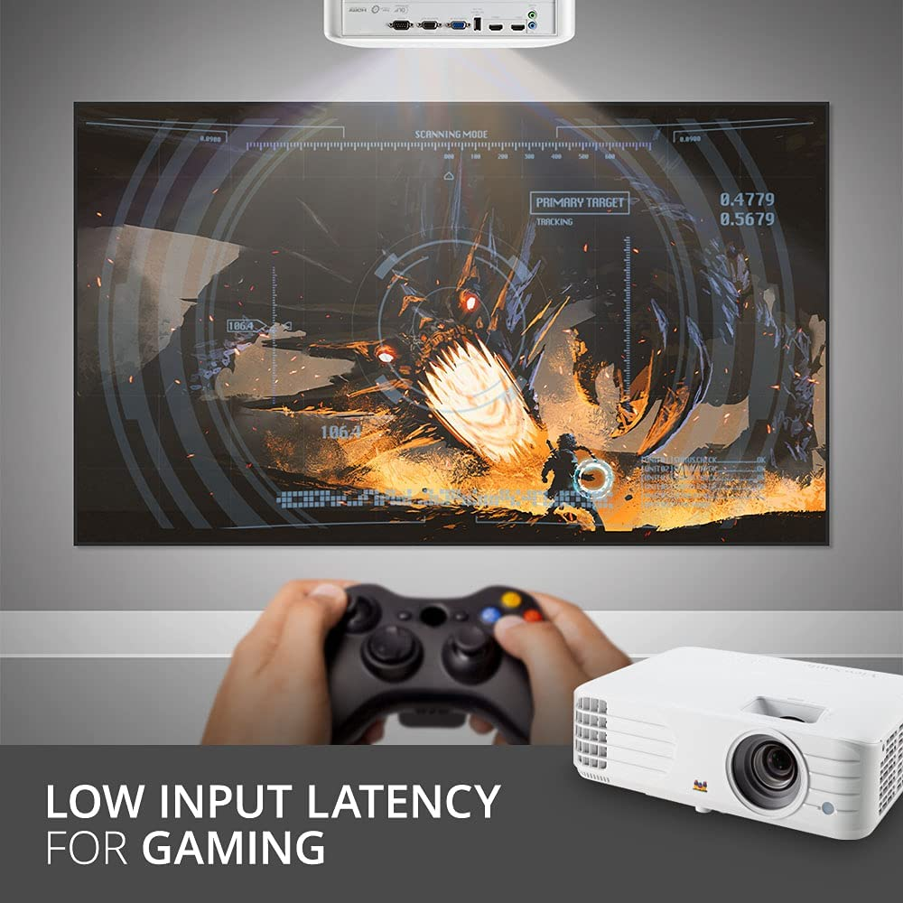 A screen with an action video game playing on the wall, projected by the ViewSonic PX701HD. A pair of hands are holding a video game controller in front of the screen. The bottom of the image has a front view of the ViewSonic PX701HD over a banner that says "LOW INPUT LATENCY FOR GAMING".