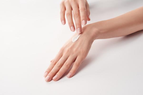 A close-up of hands shaking

Description automatically generated with medium confidence