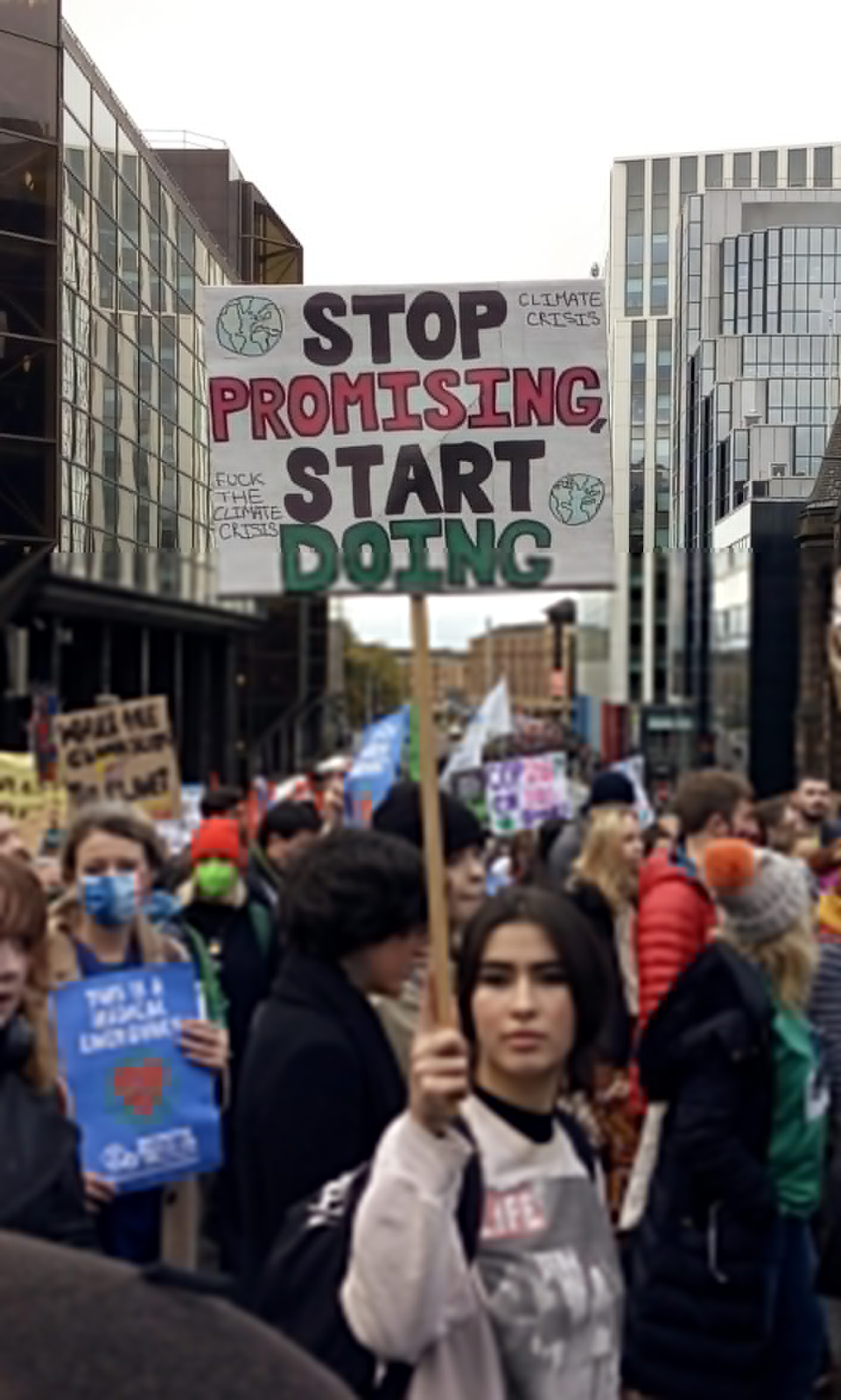 "Stop promising, start doing" at COP26 Glasgow Youth Climate Strike.