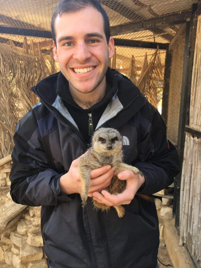 Yoshua Goodman a csu vet student. meerkat named Henry he cared for in The Negev Zoo,