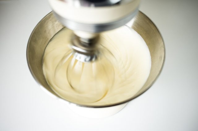 Whisk the cream until it begins to hold its shape.